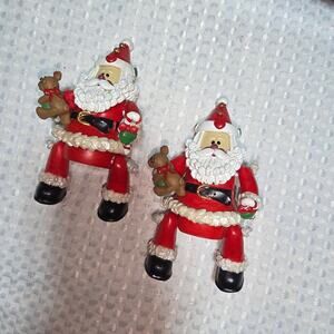 CERAMIC WORLD SET OF 2 SANTA MOVING ARMS LEGS SHELF SITTER OR ORNAMENT